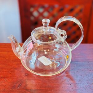 Tetera de cristal de asa alta